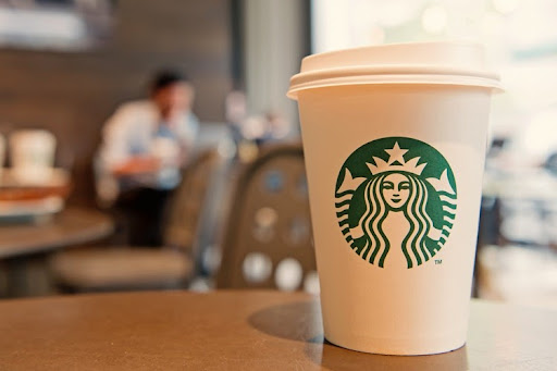 Starbucks logo on every coffee cup